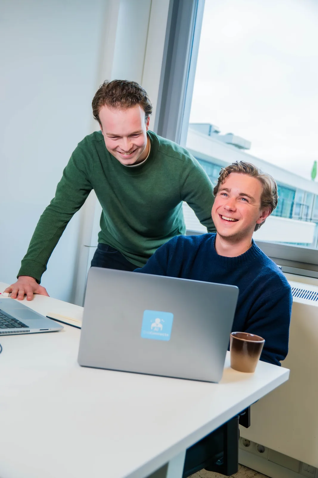 Samen een workflow bouwen achter de laptop
